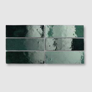 six Camden green ceramic wall tiles, brick shaped, in the colour white