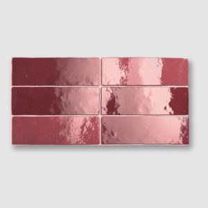 six Camden ceramic wall tiles, brick shaped, in the colour garnet,