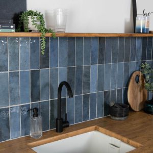 bathroom showing Camden blue ceramic wall tiles, metro shaped.