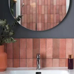 Bathroom showing Camden rose mellow ceramic wall tiles, metro shaped.