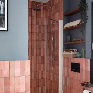 Bathroom showing Camden rose mellow ceramic wall tiles, metro shaped.