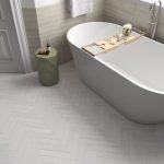 room showing Helsinki White porcelain tiles, metro shaped.