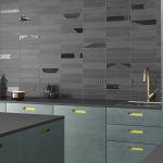 room showing Helsinki dark grey porcelain tiles, metro shaped.