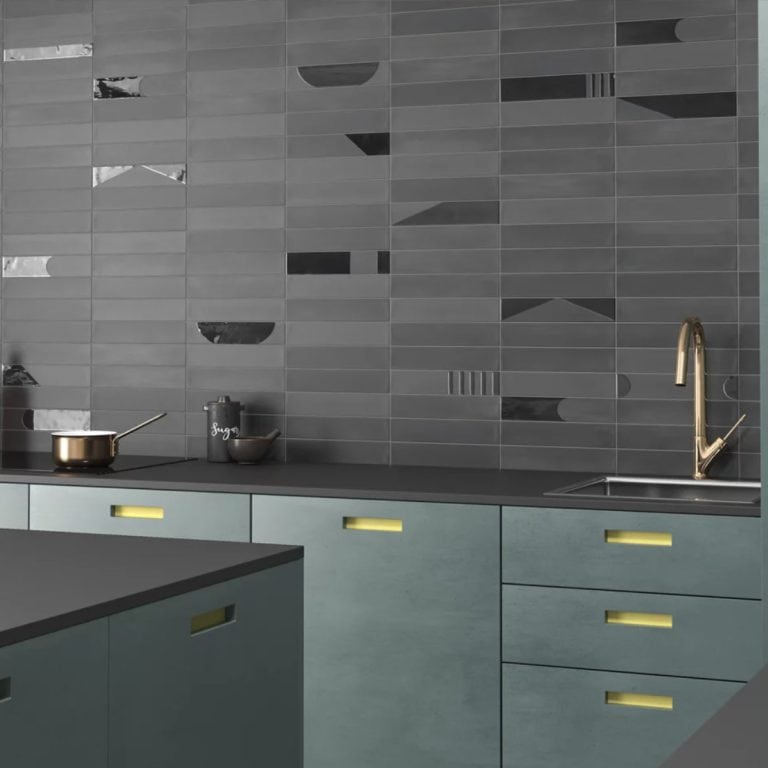 room showing Helsinki dark grey porcelain tiles, metro shaped.